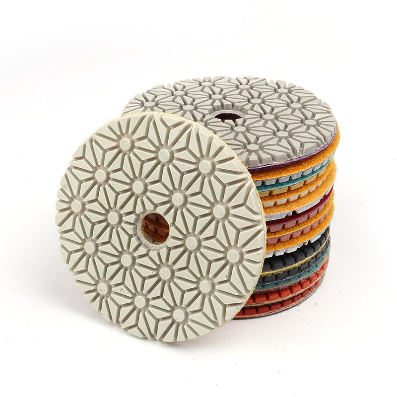 Back view of 4-inch 3-step polishing pad with 3000 grit for mirror finish, color-coded hook and loop backing for quick change on angle grinders.